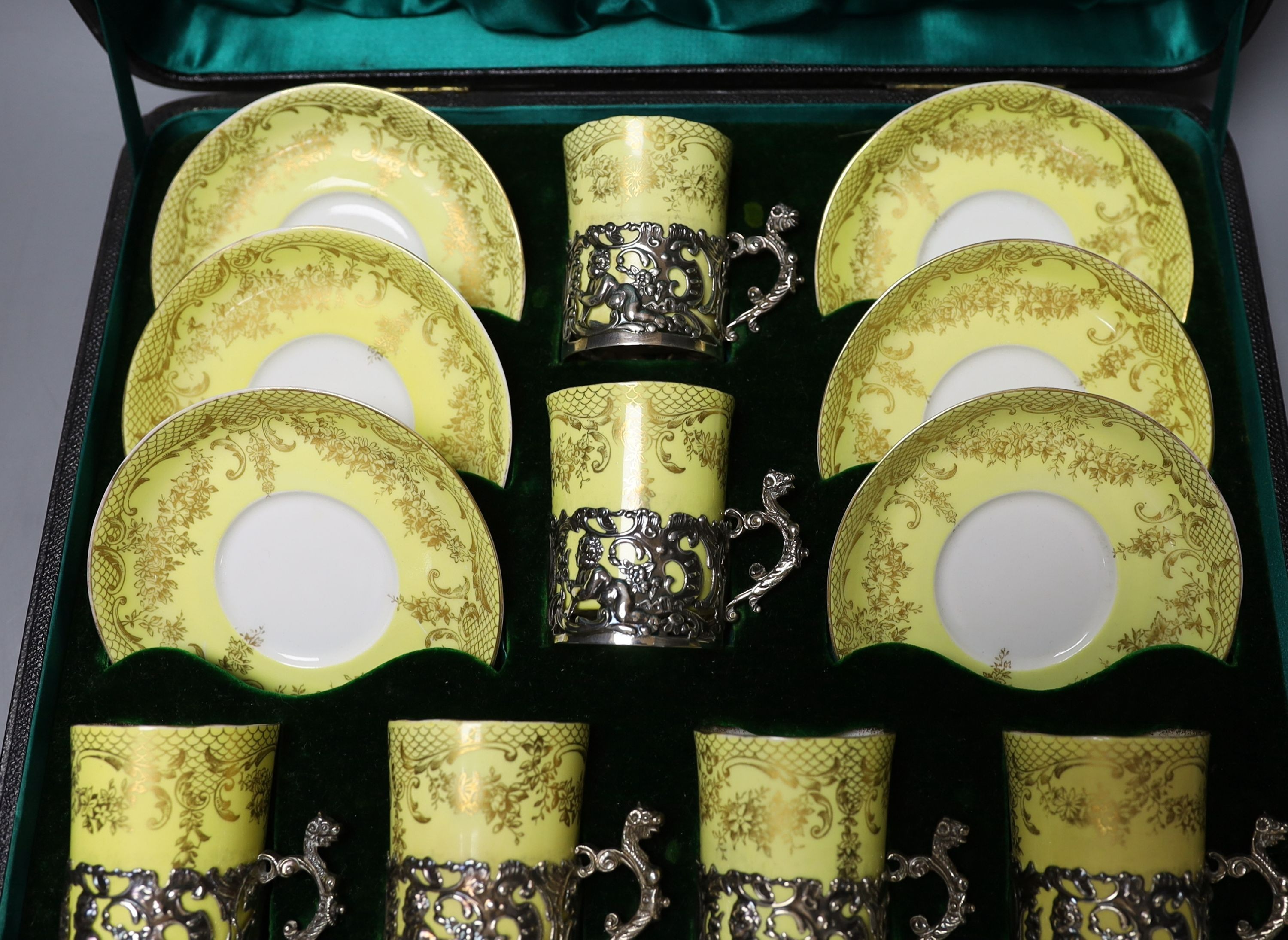 A cased Staffordshire Eggshell silver-mounted coffee set